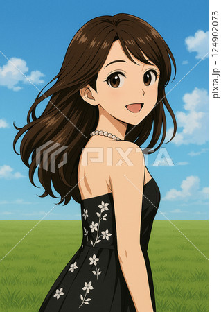 芝生で髪をなびかせる女性 124902073