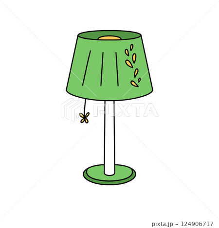 A green lamp with a yellow shade and a leaf design 124906717