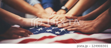 People joining hands on USA flag background 124908301