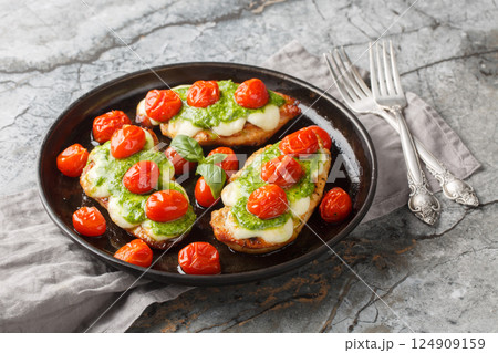 Margherita Chicken is the perfect flavour combo of basil and tomato and is topped with delicious, melty mozzarella cheese close-up. Horizontal Margherita Chicken is the perfect flavour combo of basil and tomato and is topped with delicious, melty mozzarella cheese close-up. Horizontal 124909159