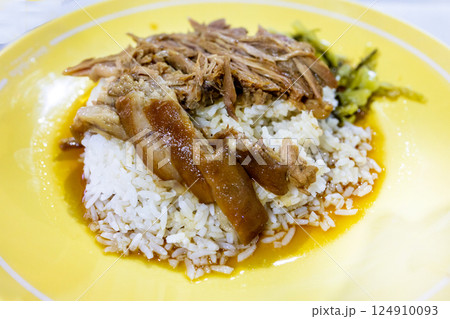 Top view of Stewed pork leg on rice, focus selective 124910093