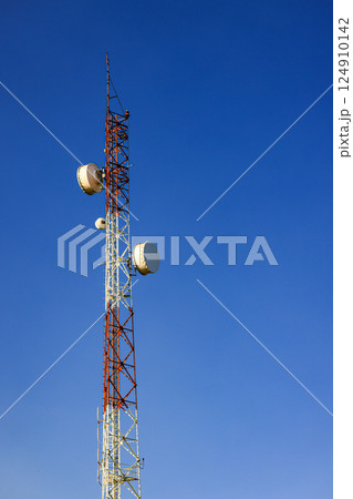 Detail of Transmitting and radio antenna Tower, steel Structure installed with dual polarization microwave antenna or Hyperbolic Antenna. Frame for modern metal building with beautiful sky. Detail of Transmitting and radio antenna Tower, steel Structure installed with dual polarization microwave antenna or Hyperbolic Antenna. Frame for modern metal building with beautiful sky. 124910142