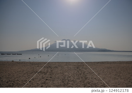 March 23 2025 Tranquil Beach Scene with Volcanic Mountain in the Distance, Japan March 23 2025 Tranquil Beach Scene with Volcanic Mountain in the Distance, Japan 124912178