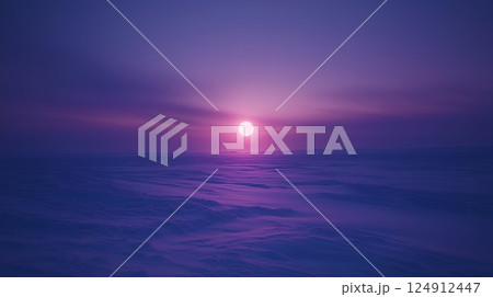 Beautiful sunset over a calm ocean. The sky is a deep purple color, and the sun is setting in the distance. Scene is peaceful and serene, as the calm waters 124912447