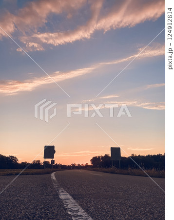 Road with two large billboards on either side 124912814