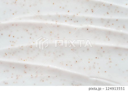 Smooth white cream texture with exfoliating brown specks for skincare and beauty Smooth white cream texture with exfoliating brown specks for skincare and beauty 124913551