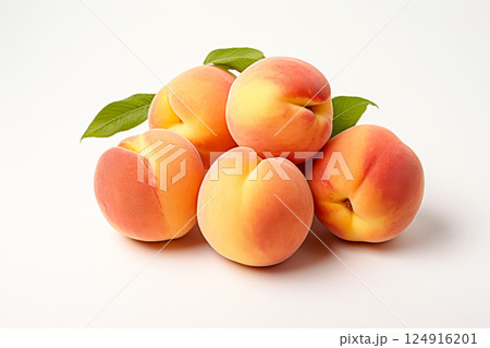 Bunch of peaches are piled up on a white background. 124916201