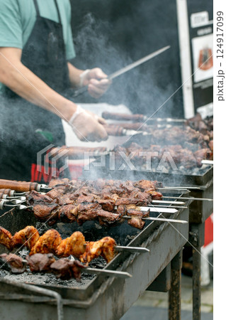 Chef Grilling Meat Skewers Street Food Chef Grilling Meat Skewers Street Food 124917099