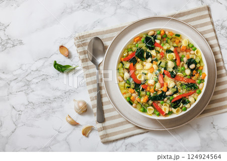 Vegetarian Minestrone with in white bowl, top view Vegetarian Minestrone with in white bowl, top view 124924564