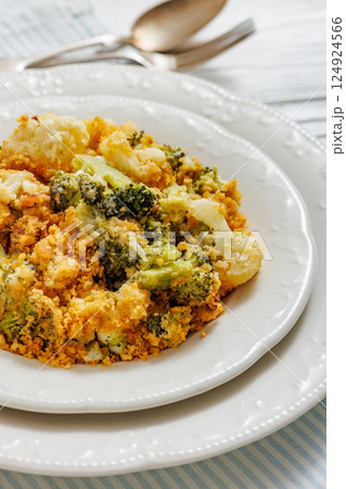 broccoli cauliflower casserole on plate, top view broccoli cauliflower casserole on plate, top view 124924566