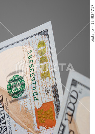 Close up of cash. New hundred dollar bills. Financial concept. 124924717