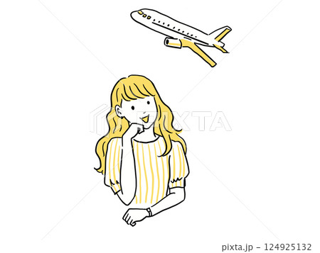 ワクワクしながら旅行計画を立てる女性 124925132