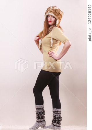 Beautiful winter woman in warm clothing 124926140