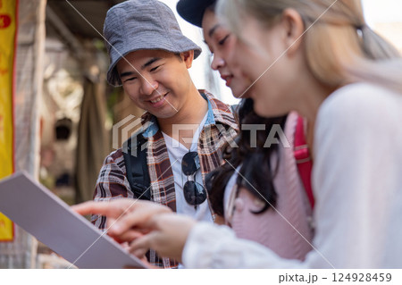 New destinations with friends travel adventure in a vibrant market engaging atmosphere joyful moments 124928459