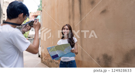 Couple traveling in a city new destinations lifestyle urban environment candid moments Couple traveling in a city new destinations lifestyle urban environment candid moments 124928633