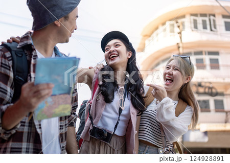Travel adventures with friends urban cityscape travel vibrant street candid moments joyful connections Travel adventures with friends urban cityscape travel vibrant street candid moments joyful connections 124928891