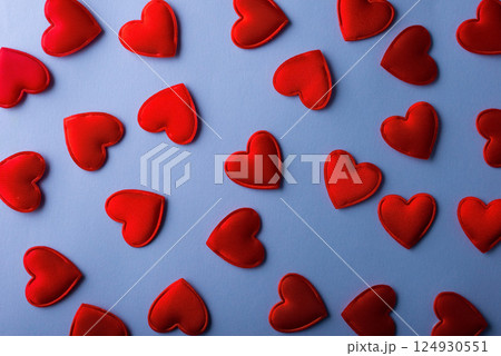 texture pattern of red hearts on blue cyan background Valentines day card concept. Heart for Valentines Day Background texture pattern of red hearts on blue cyan background Valentines day card concept. Heart for Valentines Day Background 124930551