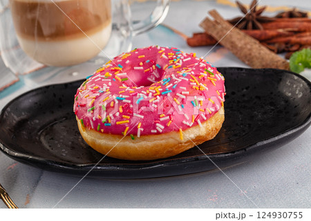 Sweet donut with strawberry icing 124930755