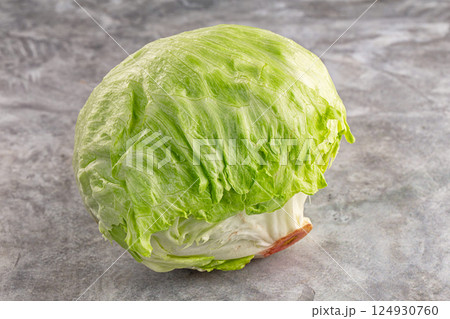 Raw iceberg salat over background Raw iceberg salat over background 124930760