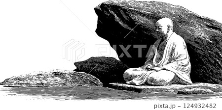 Meditative caucasian monk sitting on rocks near water in tranquil scene 124932482