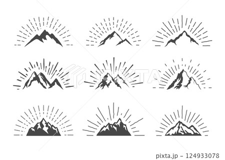 Mountain silhouettes with sunburst rays Mountain silhouettes with sunburst rays 124933078