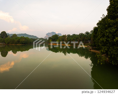 Beautiful sunset or sunrise sky nature landscape in Thailand,Amazing landscape colorful clouds over mountains in summer season background,Wide angle view drone shot 124934627