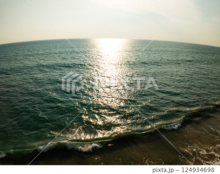 Sea surface aerial view,Bird eye view photo of waves water surface texture,Summer sea background,Beautiful nature Amazing view sea background 124934698