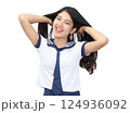 young woman in japanese student cosplay uniform on white background 124936092