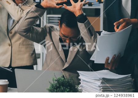 Large group of worried business people having a meeting. Large group of worried business people having a meeting. 124938961