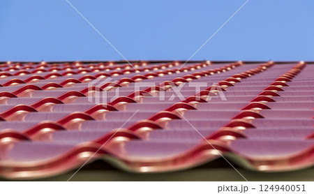 Red metal roof tiles Red metal roof tiles 124940051