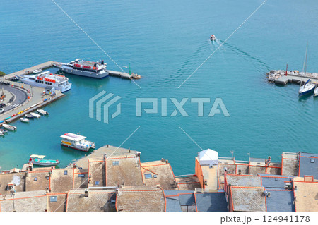 Yachts, boats in bay of Porto Venere, Liguria. Sea and tourism in Italy. Traditional buildings. Background for design. Yachts, boats in bay of Porto Venere, Liguria. Sea and tourism in Italy. Traditional buildings. Background for design. 124941178