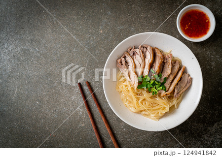 dried duck noodles in white bowl dried duck noodles in white bowl 124941842