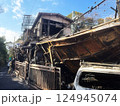burnt house with car in Japan. charred house. fire 124945074