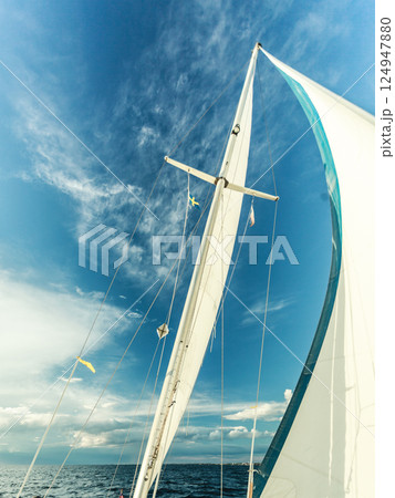 Detailed closeup of sail on sailboat Detailed closeup of sail on sailboat 124947880