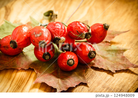 Hawthorn on wooden table background Hawthorn on wooden table background 124948009
