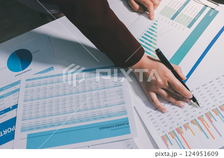 Tax deduction planning concept. Women use a calculator to calculate expenses and taxes to receive tax deductions for personal individual Income. tax return for individual persons.monthly expenses 124951609