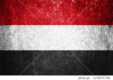 Banner of the grunge Yemen state flag. Dirty Yemen flag on a metal surface. 124951786