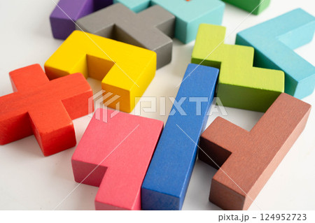 Logical thinking and problem solving problem solution creative business, wooden puzzle geometric block shape. Logical thinking and problem solving problem solution creative business, wooden puzzle geometric block shape. 124952723
