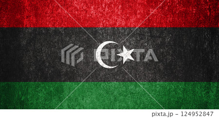 Libya State Flag. Dirty Libya flag on metal surface. 124952847