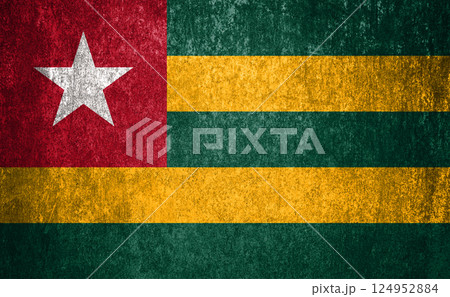 Togo State Flag. Dirty Togo flag on metal surface. 124952884