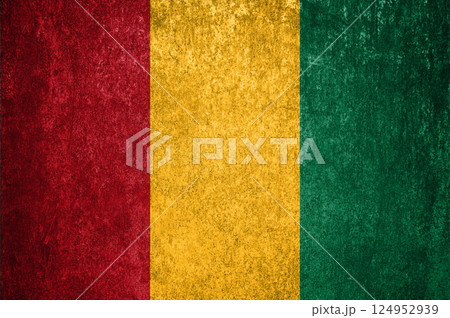 Guinea State Flag. Dirty Guinea flag on metal surface. Guinea State Flag. Dirty Guinea flag on metal surface. 124952939