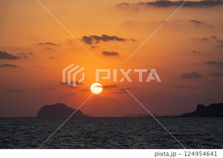 Golden Sunrise Over Jinshan Coast in Spring. Golden Sunrise Over Jinshan Coast in Spring. 124954641