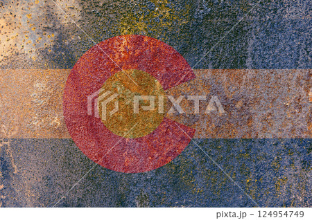 Colorado State Flag. Dirty Colorado state flag on rusty metal surface. 124954749
