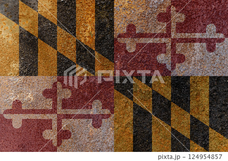 Maryland State Flag. Dirty Maryland state flag on rusty metal surface. 124954857