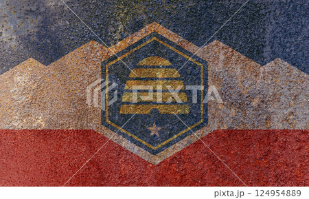 Utah State Flag. Dirty Utah state flag on rusty metal surface. 124954889