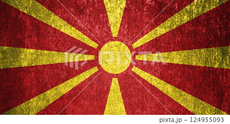 North Macedonia State Flag. Dirty North Macedonia flag on metal surface. 124955093