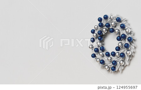 Christmas White Wreath Decoration on Wall. 3D Rendering Christmas White Wreath Decoration on Wall. 3D Rendering 124955697