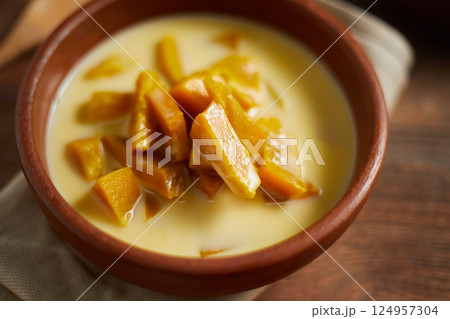 Poached Pumpkin in Coconut Milk Poached Pumpkin in Coconut Milk 124957304