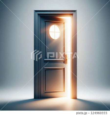 A slightly open door with a warm light inside. Space for text. 124960355