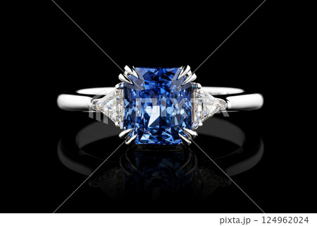 white metal ring, silver, gold with sapphire stone, diamonds on black background white metal ring, silver, gold with sapphire stone, diamonds on black background 124962024
